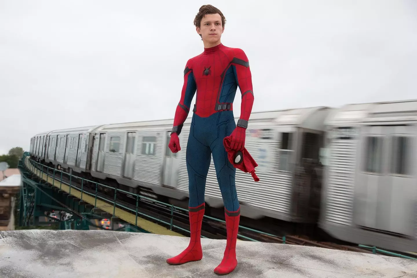 Tom Holland as Spider-Man.