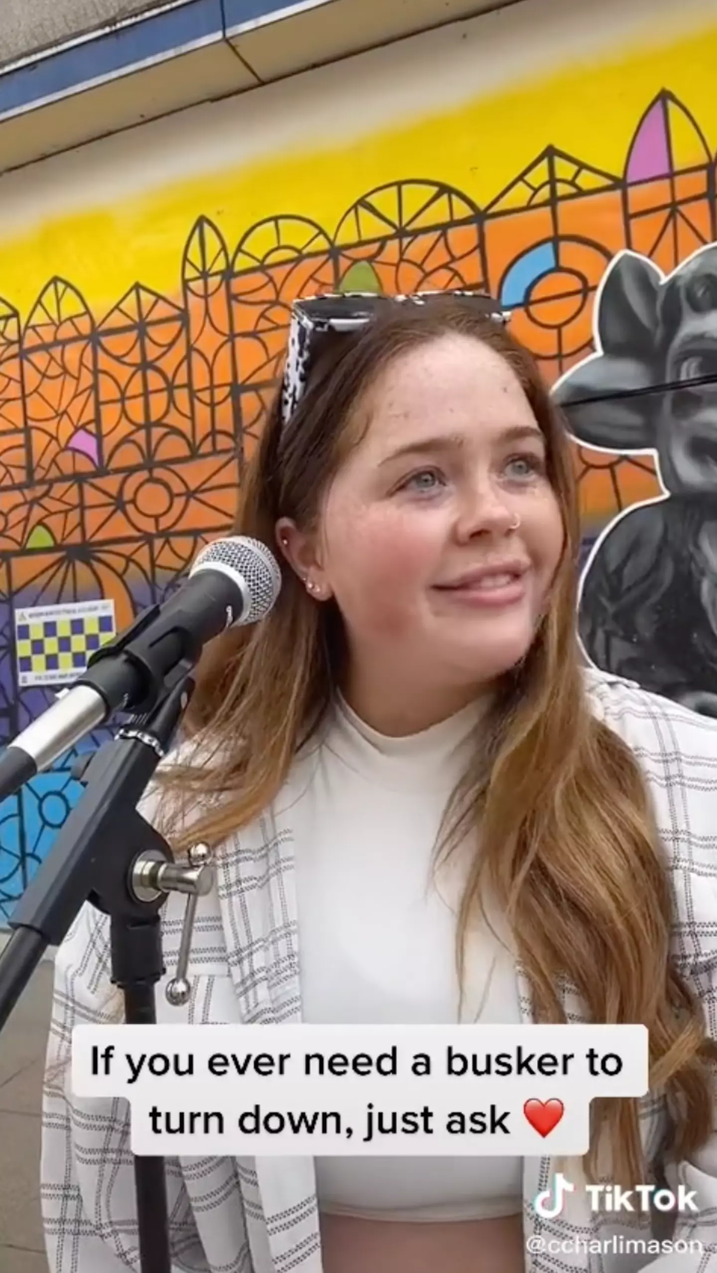 The busker explained she's always more than happy to turn down her music if people ask.