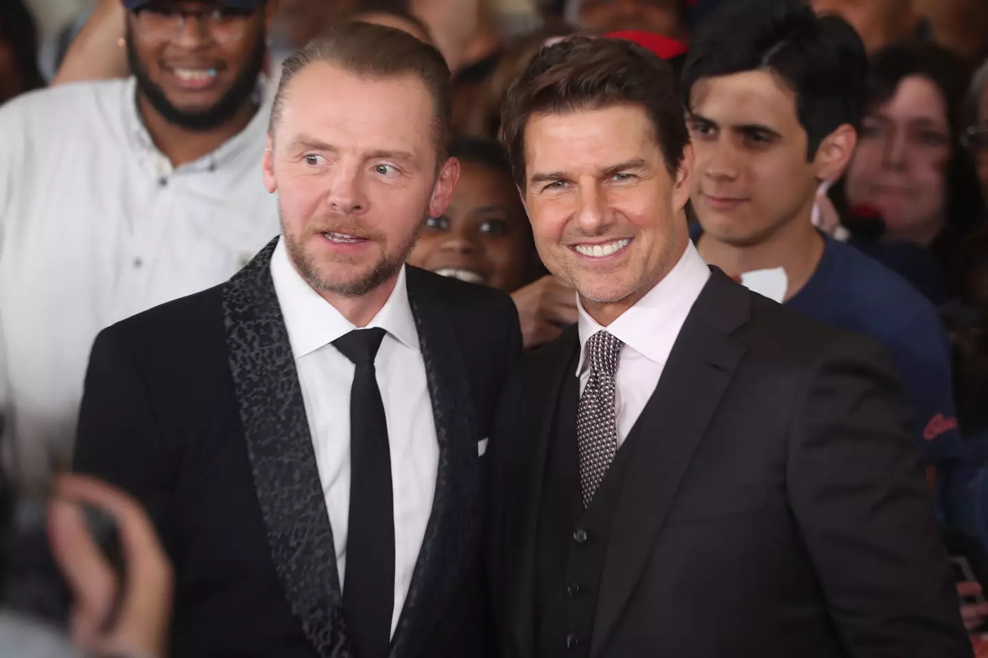 Simon Pegg and Tom Cruise.