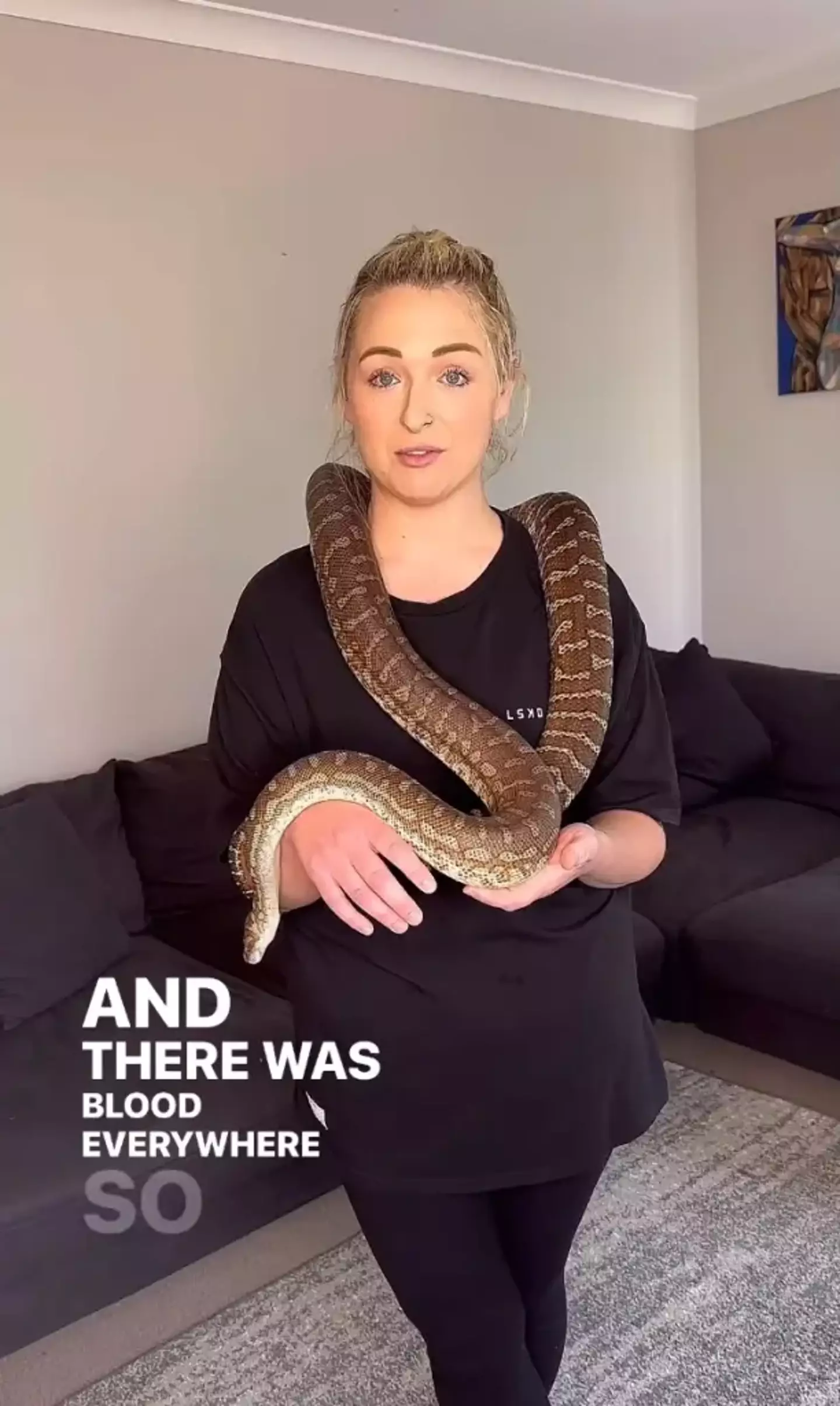 The adult star and her pet python, Betty.