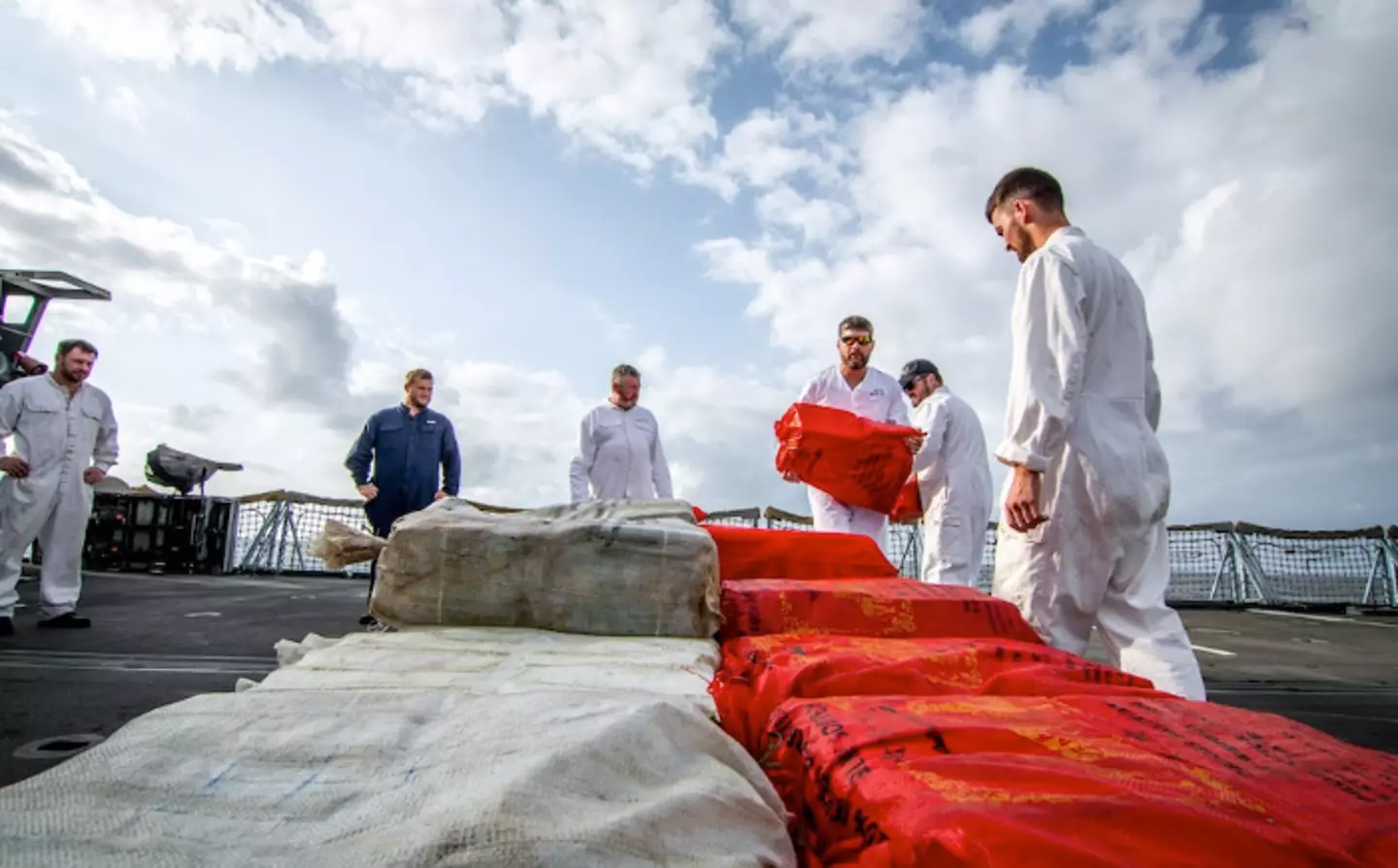 The Navy inspecting the crystal meth stash.