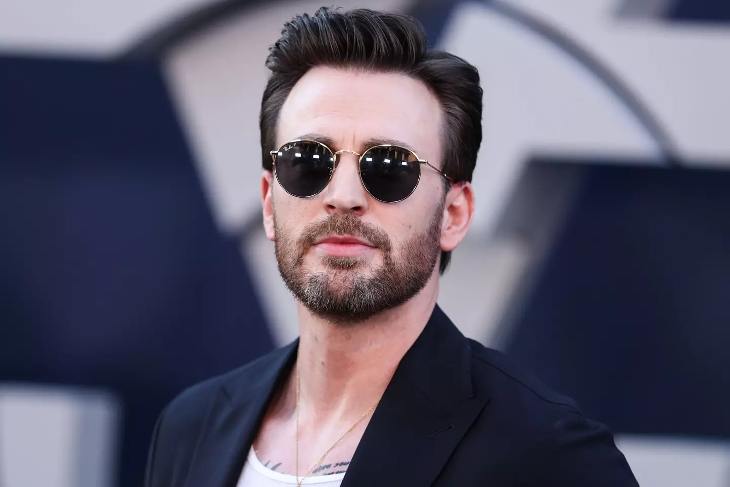 Why not wear shades when you're the sexiest man alive?