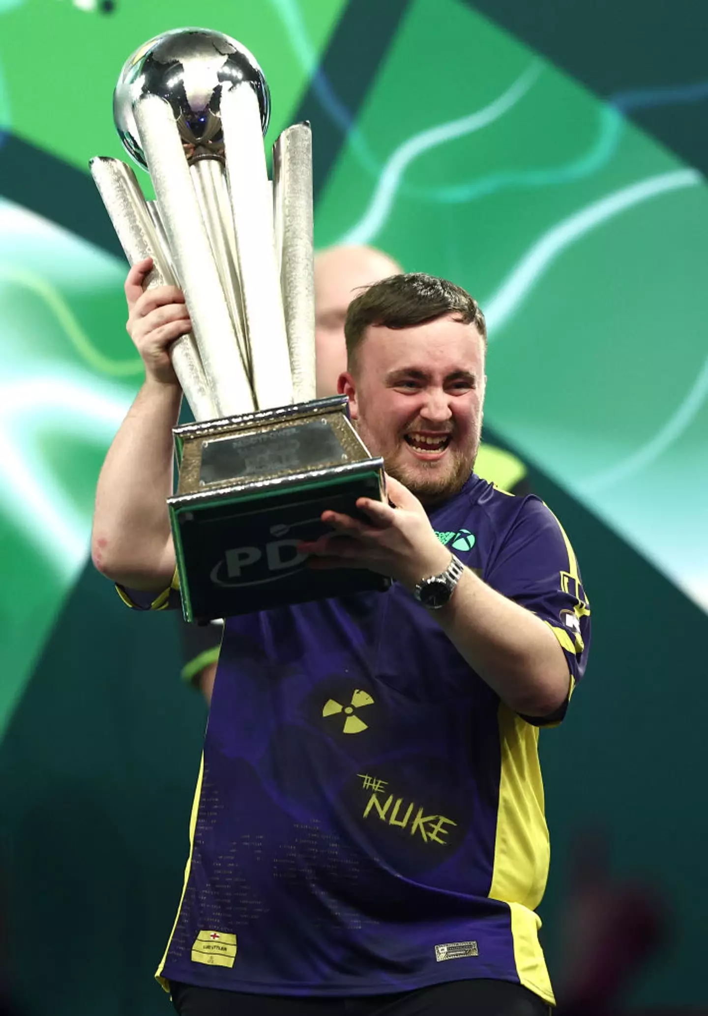 That's a very big trophy, and Luke Littler will get £500,000 prize money along with it (James Fearn/Getty Images)