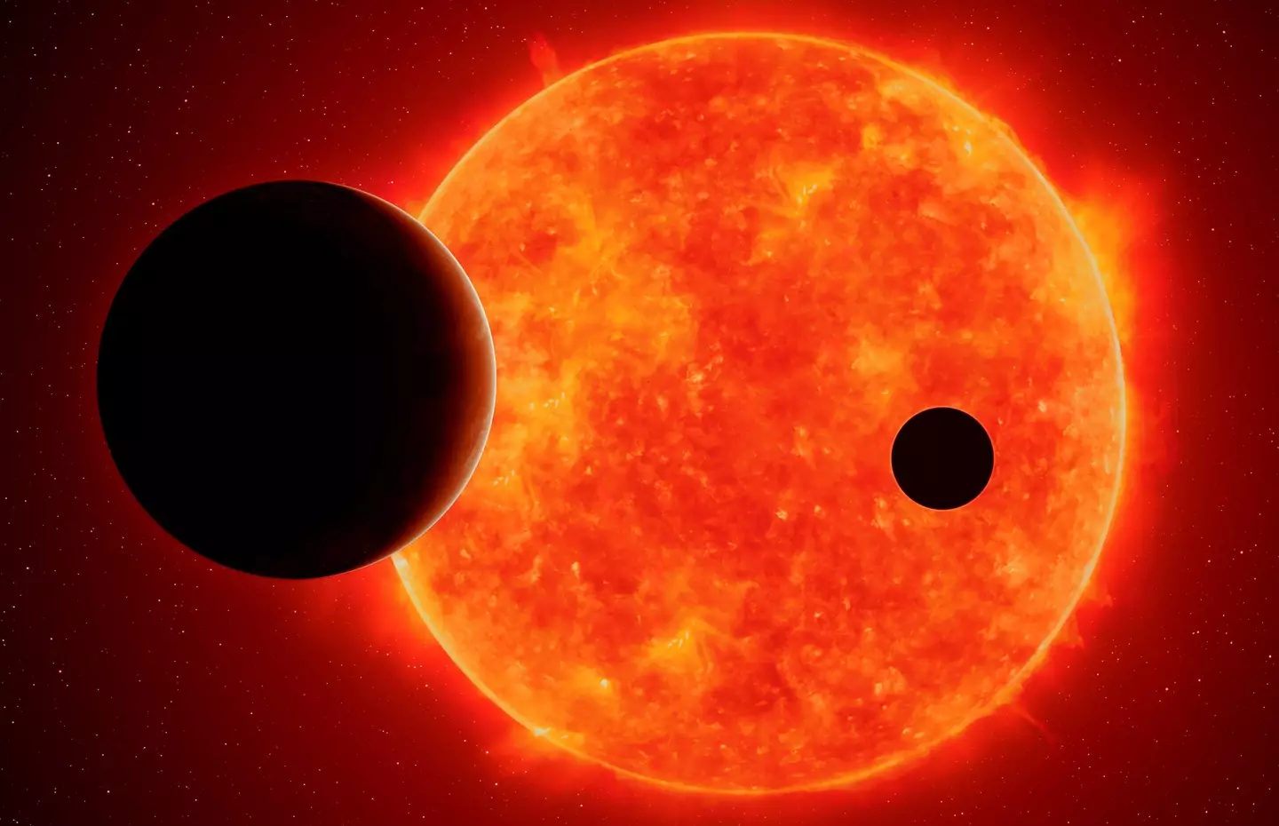 Artist's impression of two planets orbiting a red dwarf.