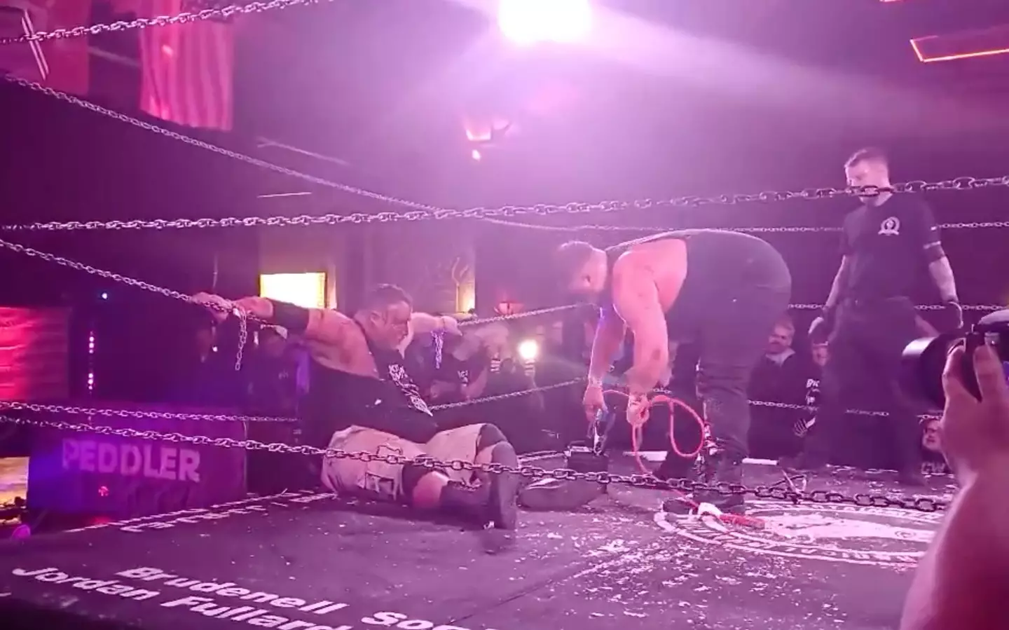 Jack Harrop appeared to electrocute his 49-year-old dad in the brutal death match (X/@BritWresAwayDay)