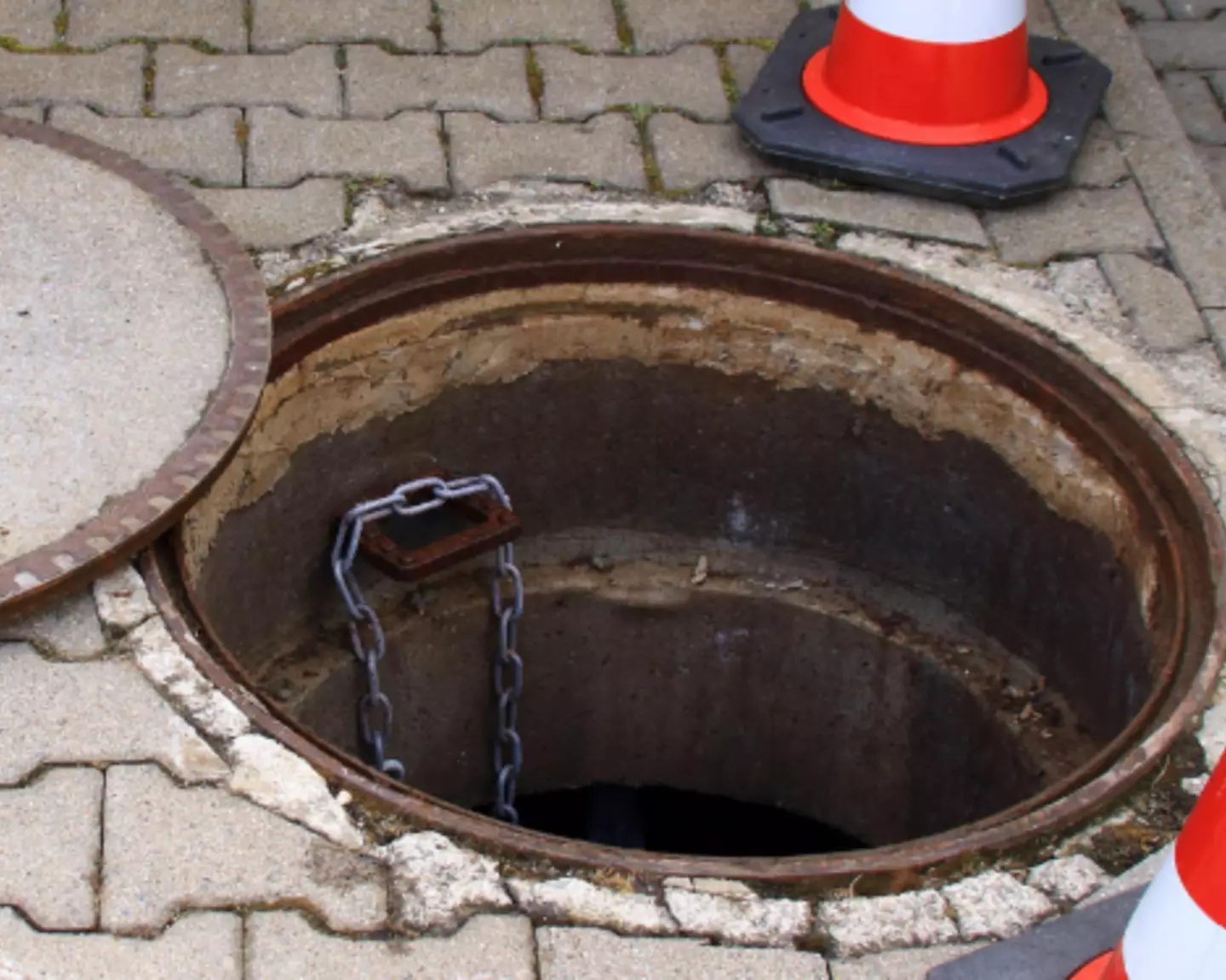 The manhole murder was the story that came to mind for the forensic pathologist.