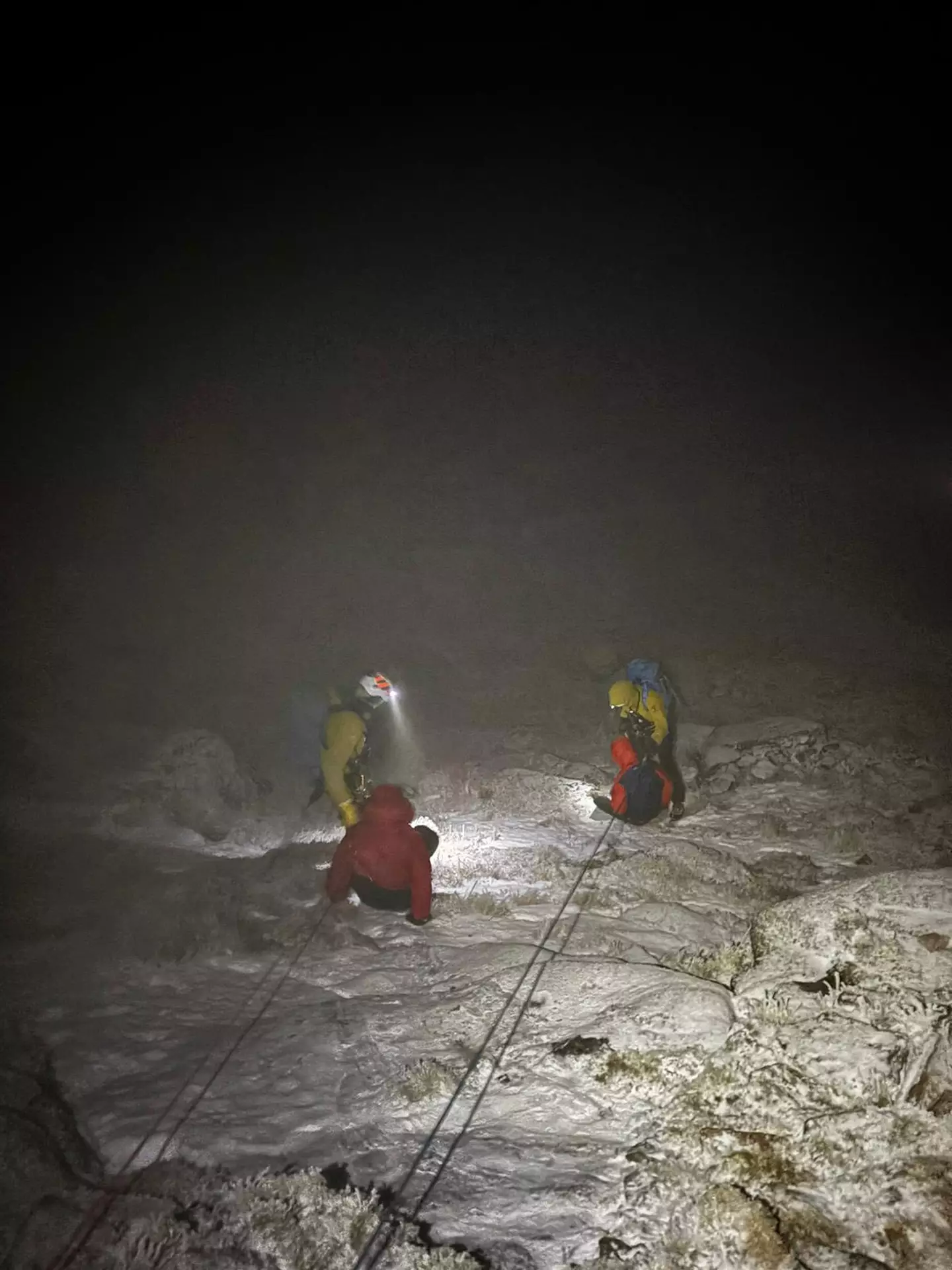 Two men wearing trainers and jogging bottoms tried to climb a mountain at 6pm in winter, less than three hours later mountain rescue was called to help (Cairngorm Mountain Rescue Team/Facebook)