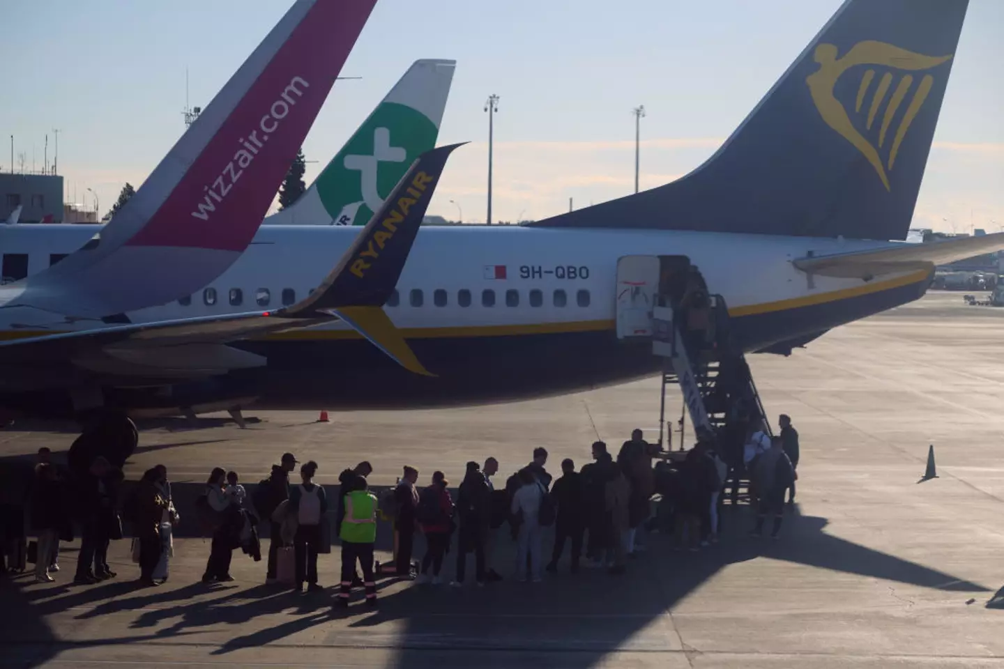 "When I get on board I'm going to ask for a different seat." "Can you not?" (Jaap Arriens/NurPhoto via Getty Images)