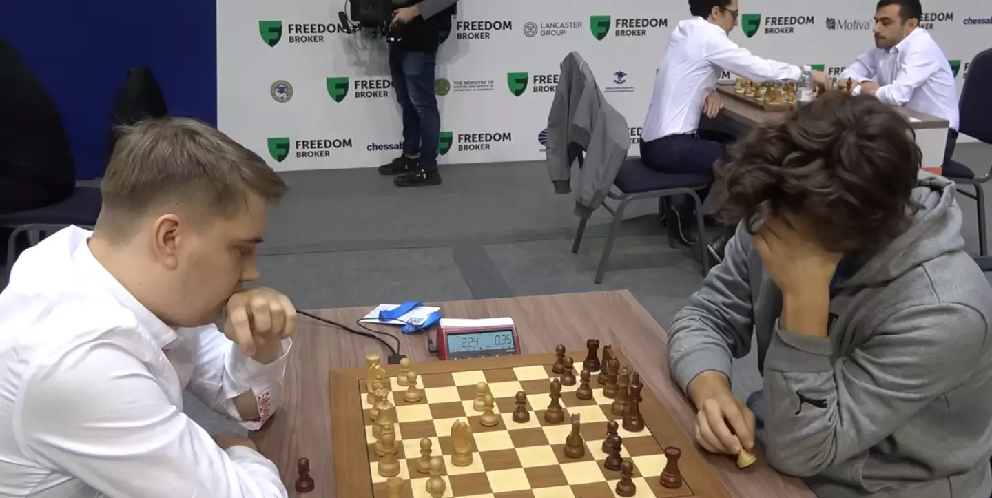 The chess grandmaster arrived over two minutes late to the game.