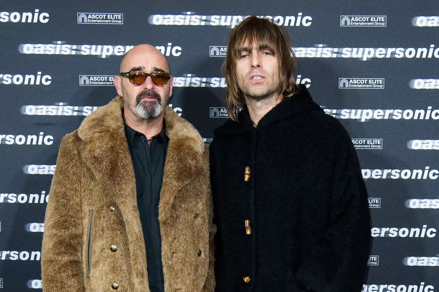 Bonehead, pictured with Liam in 2016, said he will be back on stage in November (Matthias Nareyek/Getty Images)