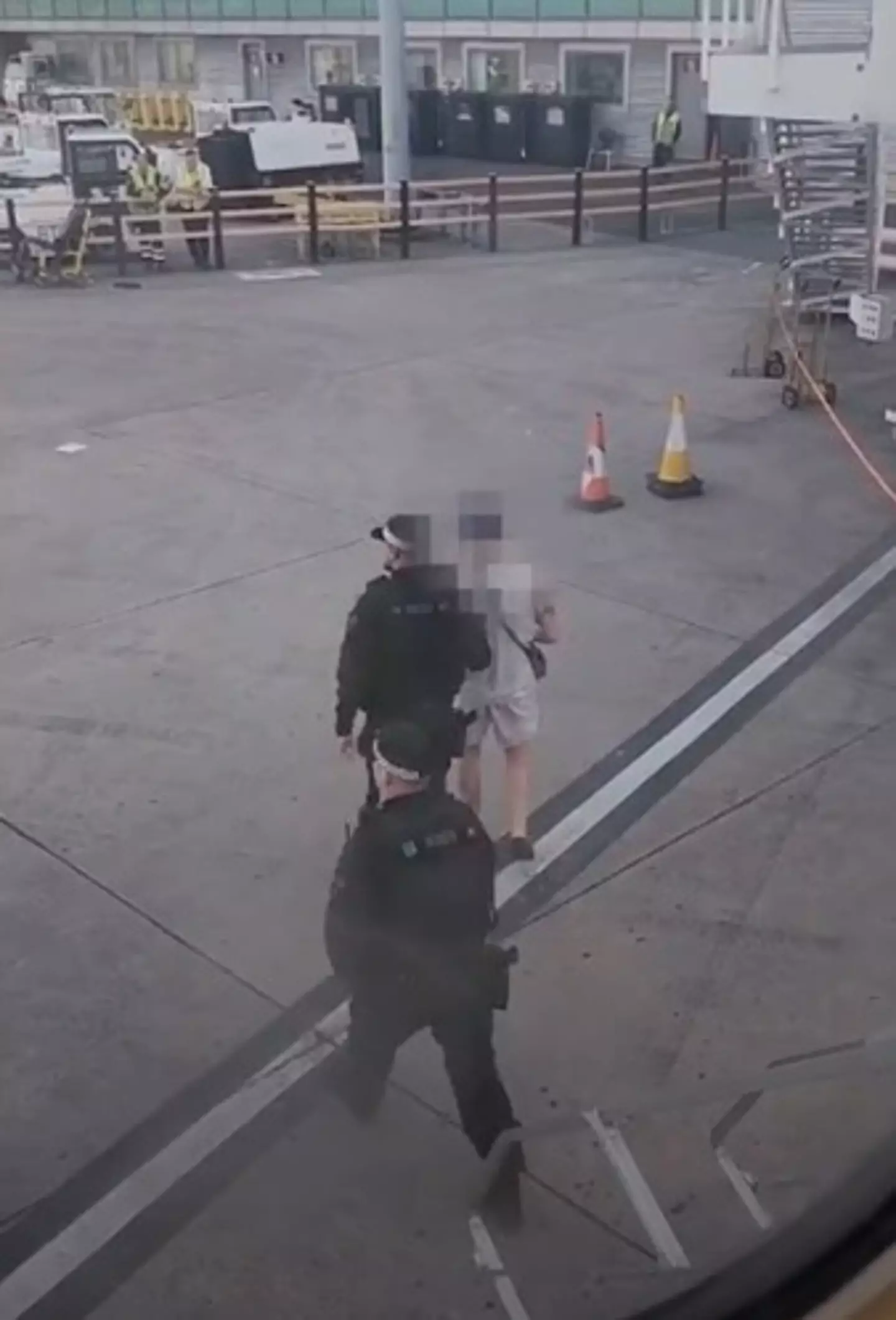 He was led away by police.