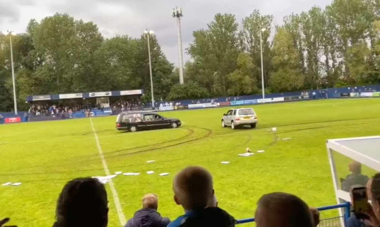 A hearse drove onto the pitch.