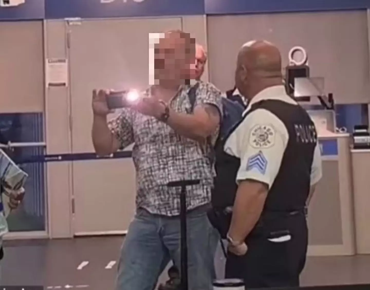 The plane was diverted to Chicago so the passenger could be removed.