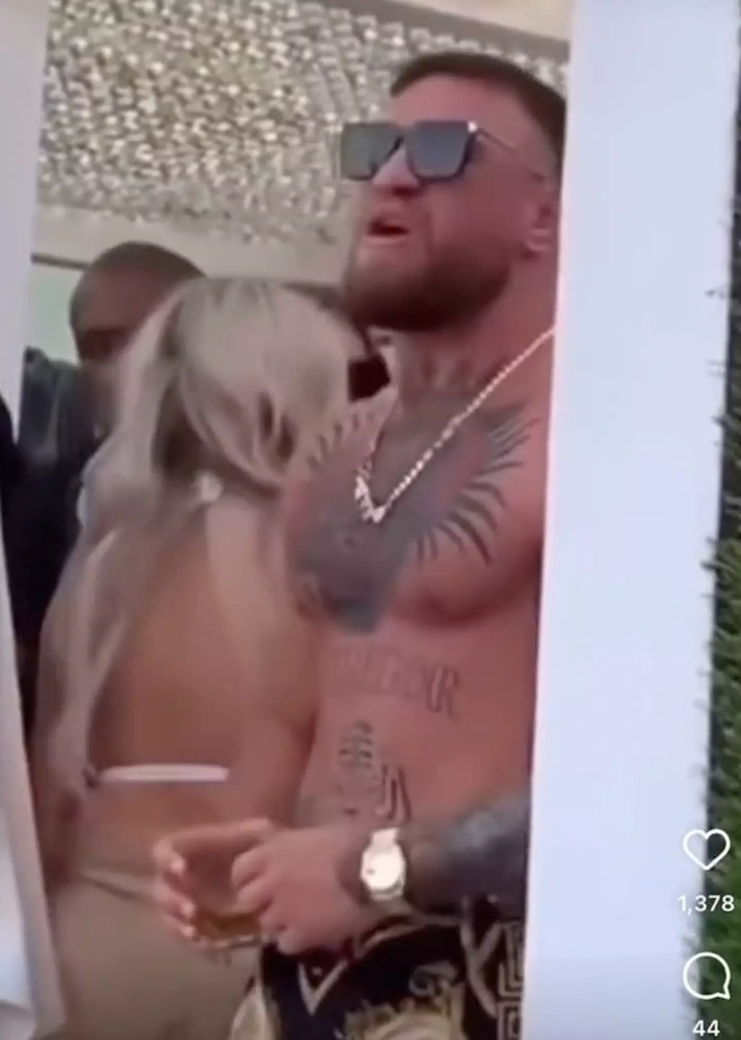 The UFC star was celebrating his 34th Birthday with friends and family by throwing a lavish doo at what looked like a beach club.