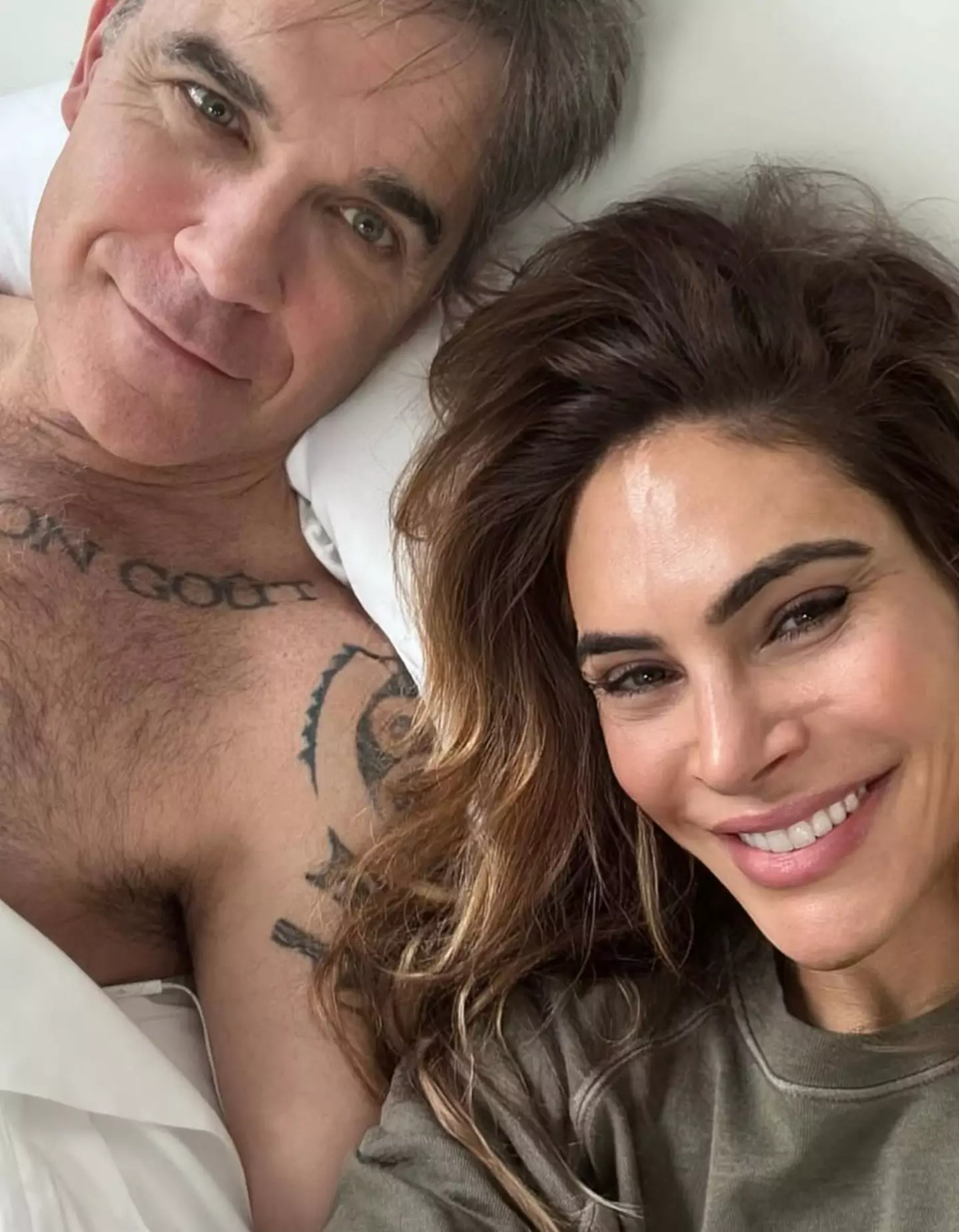 Ayda previously said her and Robbie's marital bed was more like a 'joint work space' (Instagram/@aydafieldwilliams)