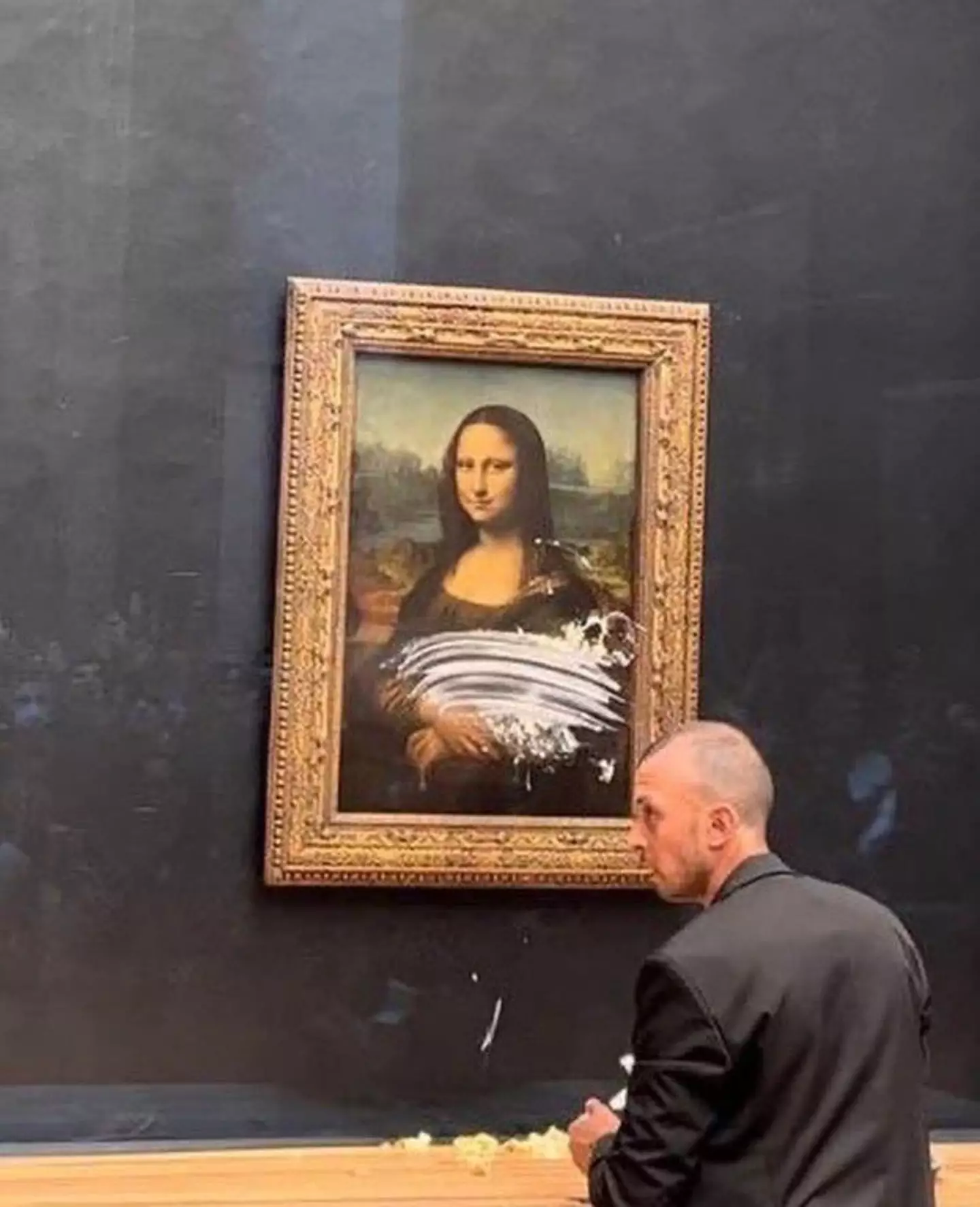 A man smeared cake over the Mona Lisa at the Louvre.