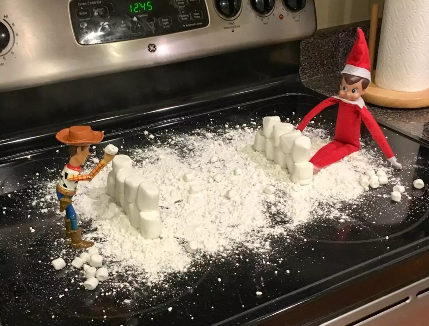 Elf in a snowball fight. (