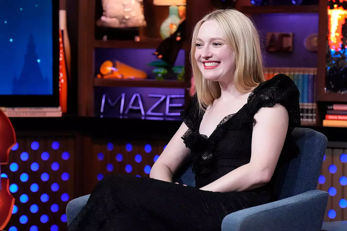 Dakota Fanning is really cashing in on her friendship with Tom Cruise (Charles Sykes/Bravo via Getty Images)