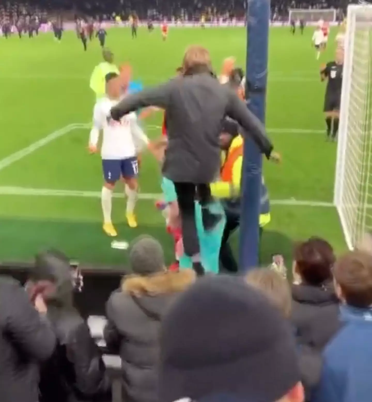 The fan was seen kicking the Arsenal goalkeeper.