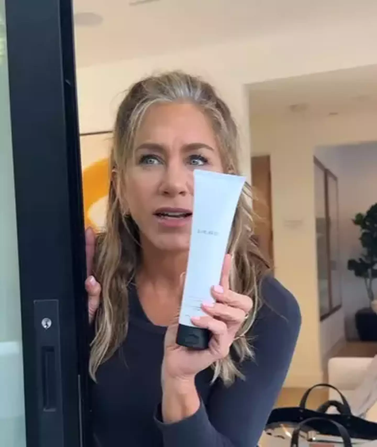 The Friends star showed off her grey roots.