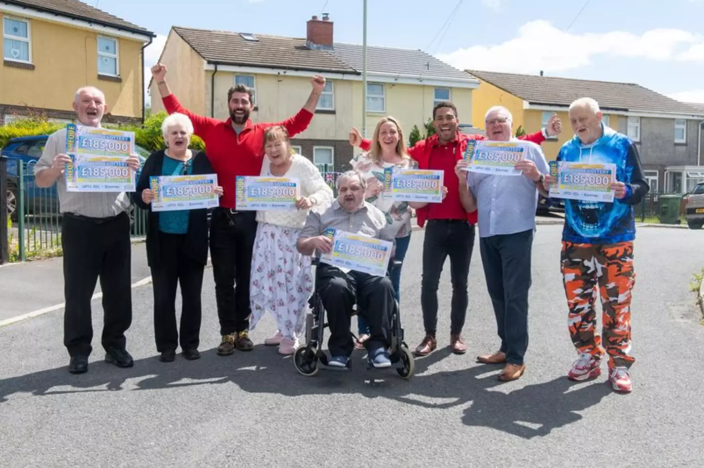 Nine neighbours from Pen-Y-Dre took home the biggest portion of the cash draw after their postcode was named the big winner.