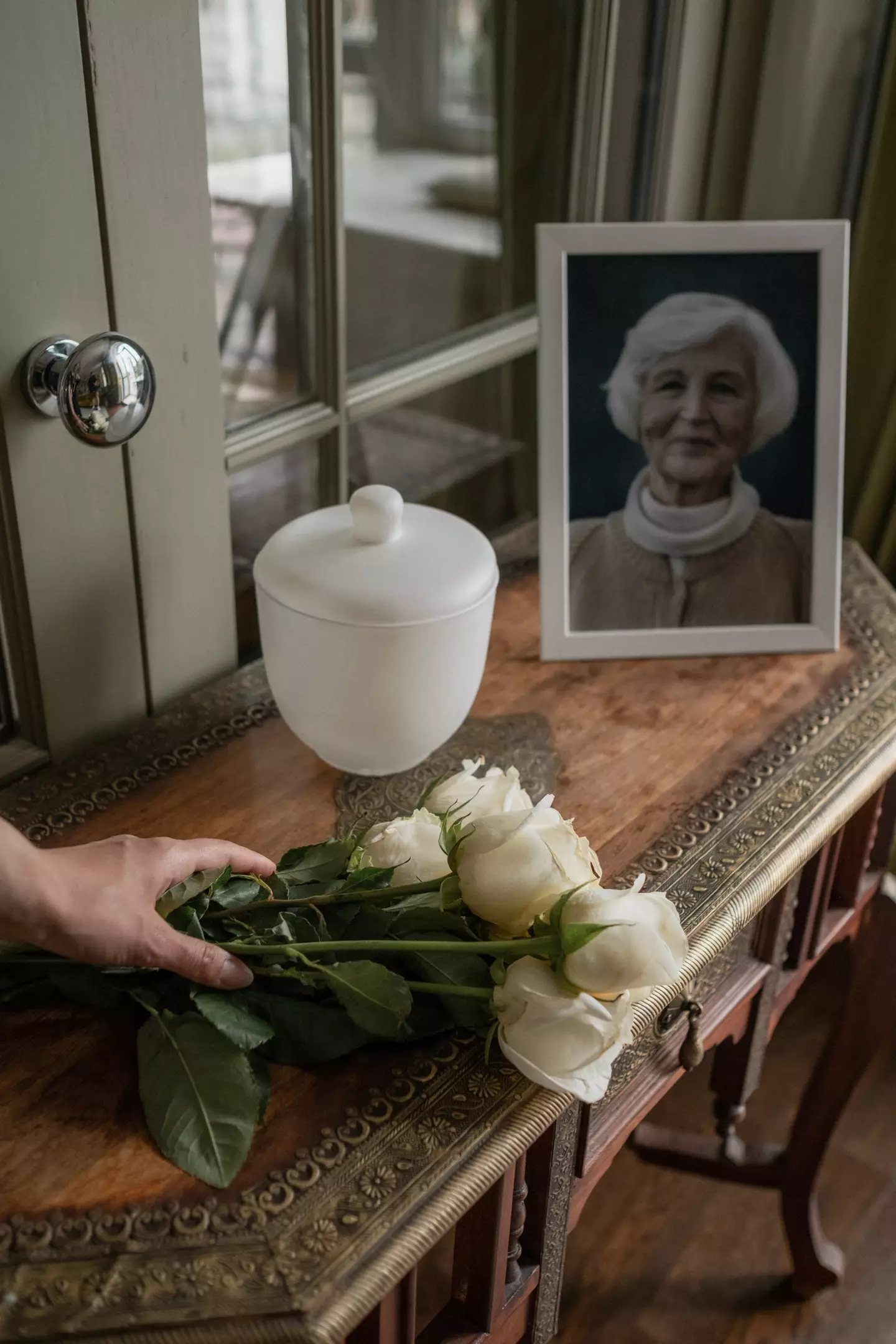 The person's ashes are then placed into an urn.