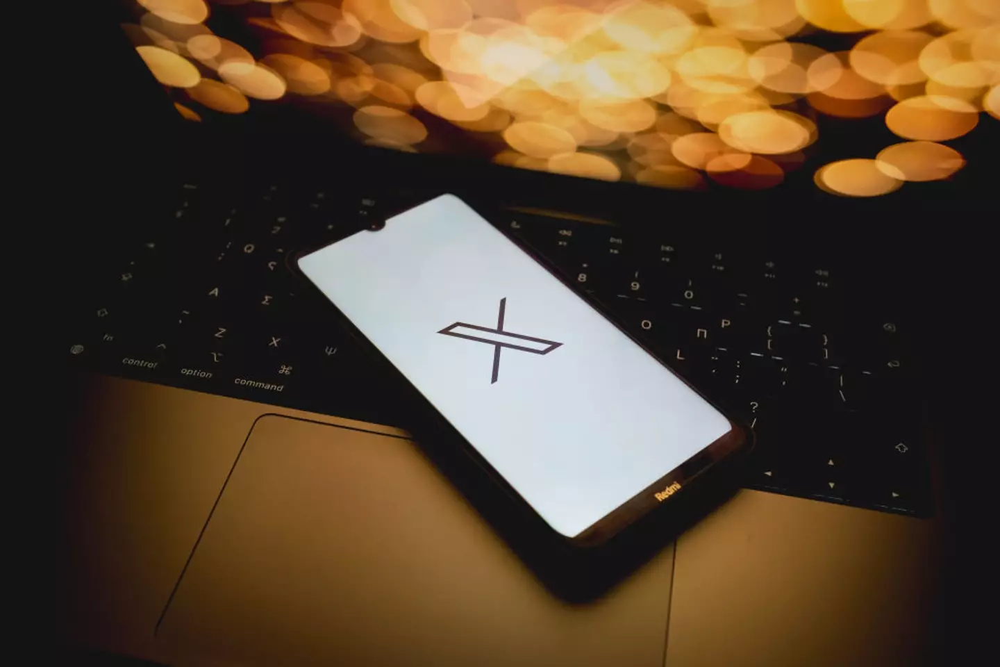 X said it wants 'adults to engage with and create content that reflects their own beliefs'. (Nikolas Kokovlis/NurPhoto via Getty Images)