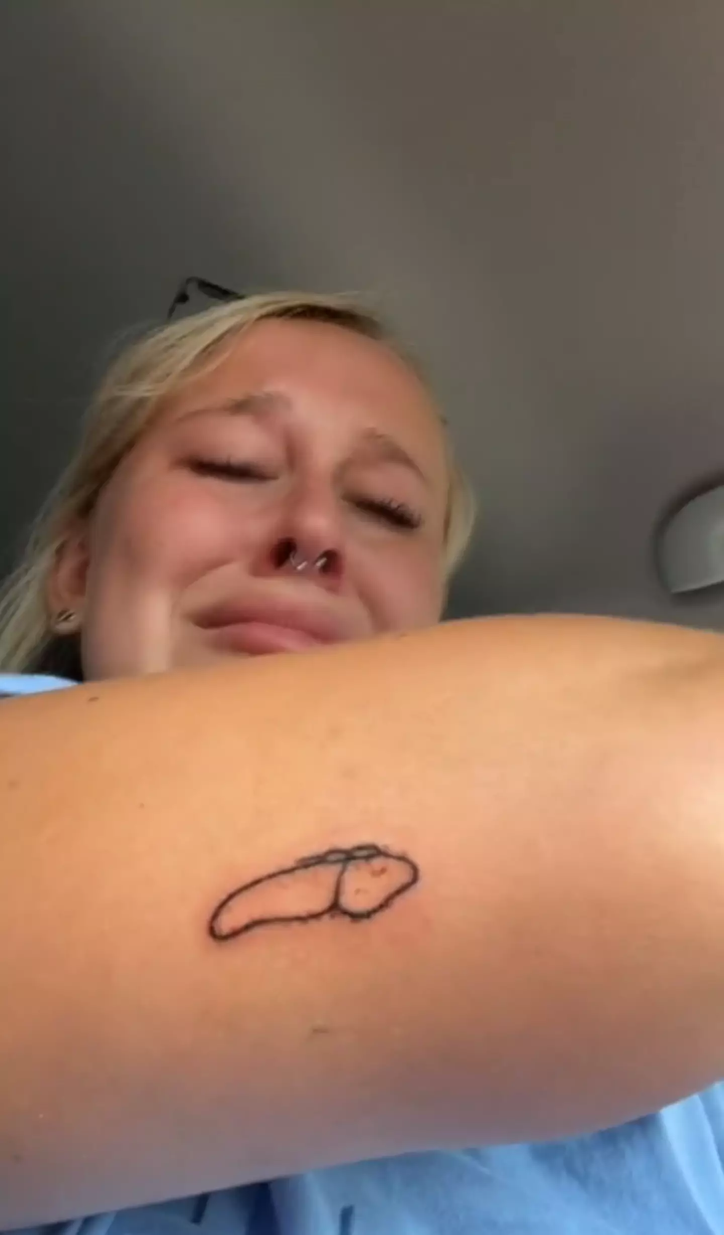 A woman was left in tears after getting matching tattoos with a pal (TikTok/@lanicole001)