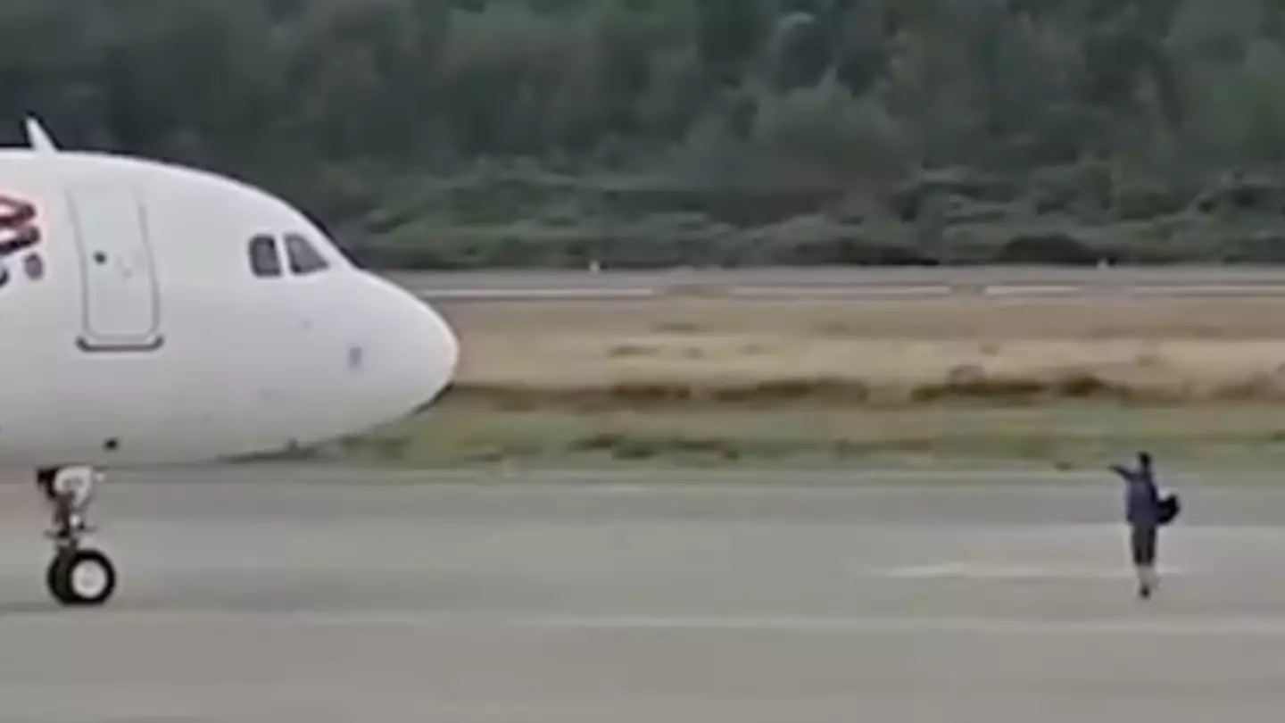 Shocking reason passenger walked onto airport runway to block plane from departing