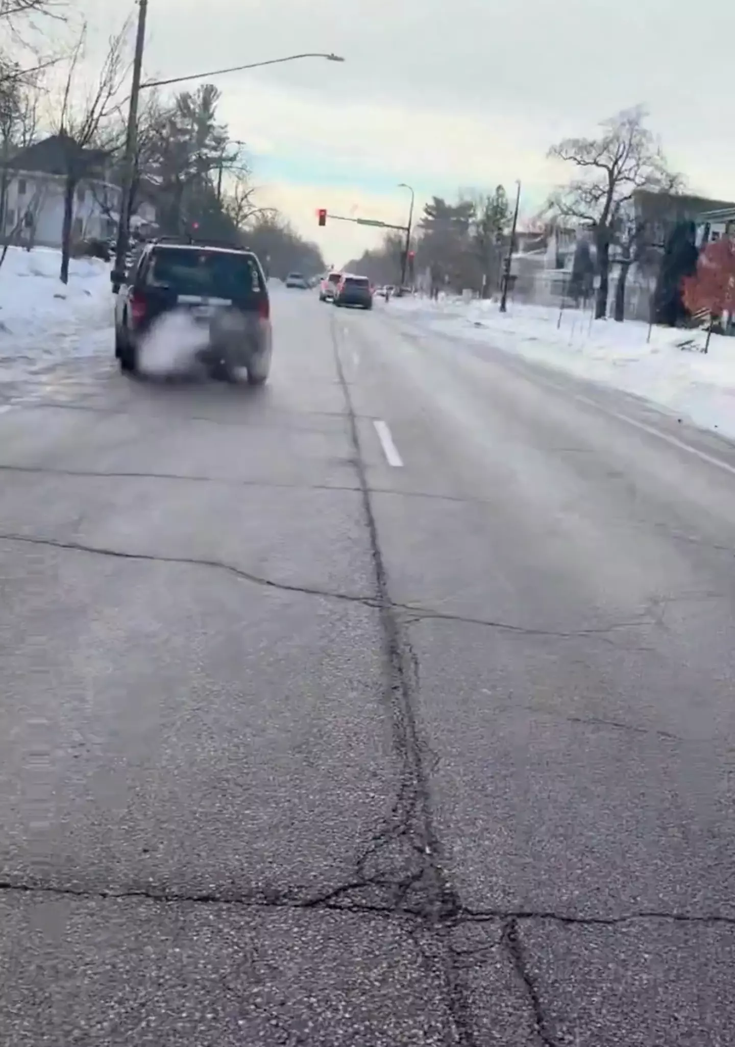 The car skidded away before crashing into parked cars down the street (Alpha News)