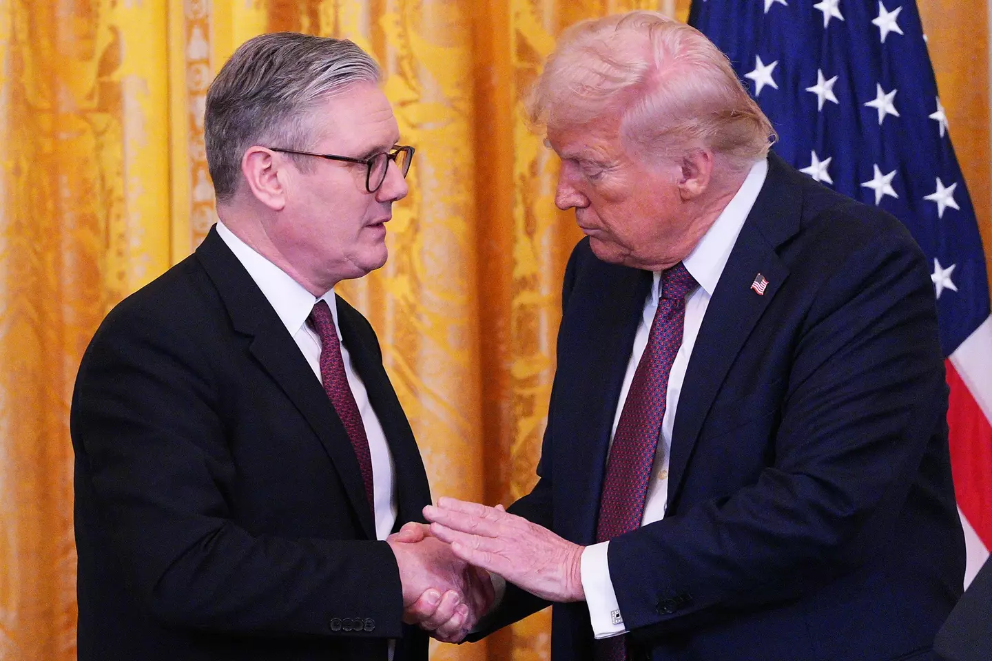 UK business owners are hoping Starmer can smooth things out with the US President (CARL COURT/POOL/AFP via Getty Images)