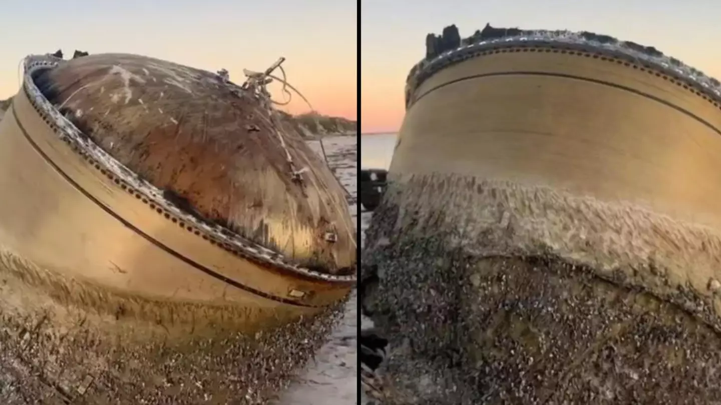 Unidentified mysterious cylinder washes up on beach as police urge public to stay away