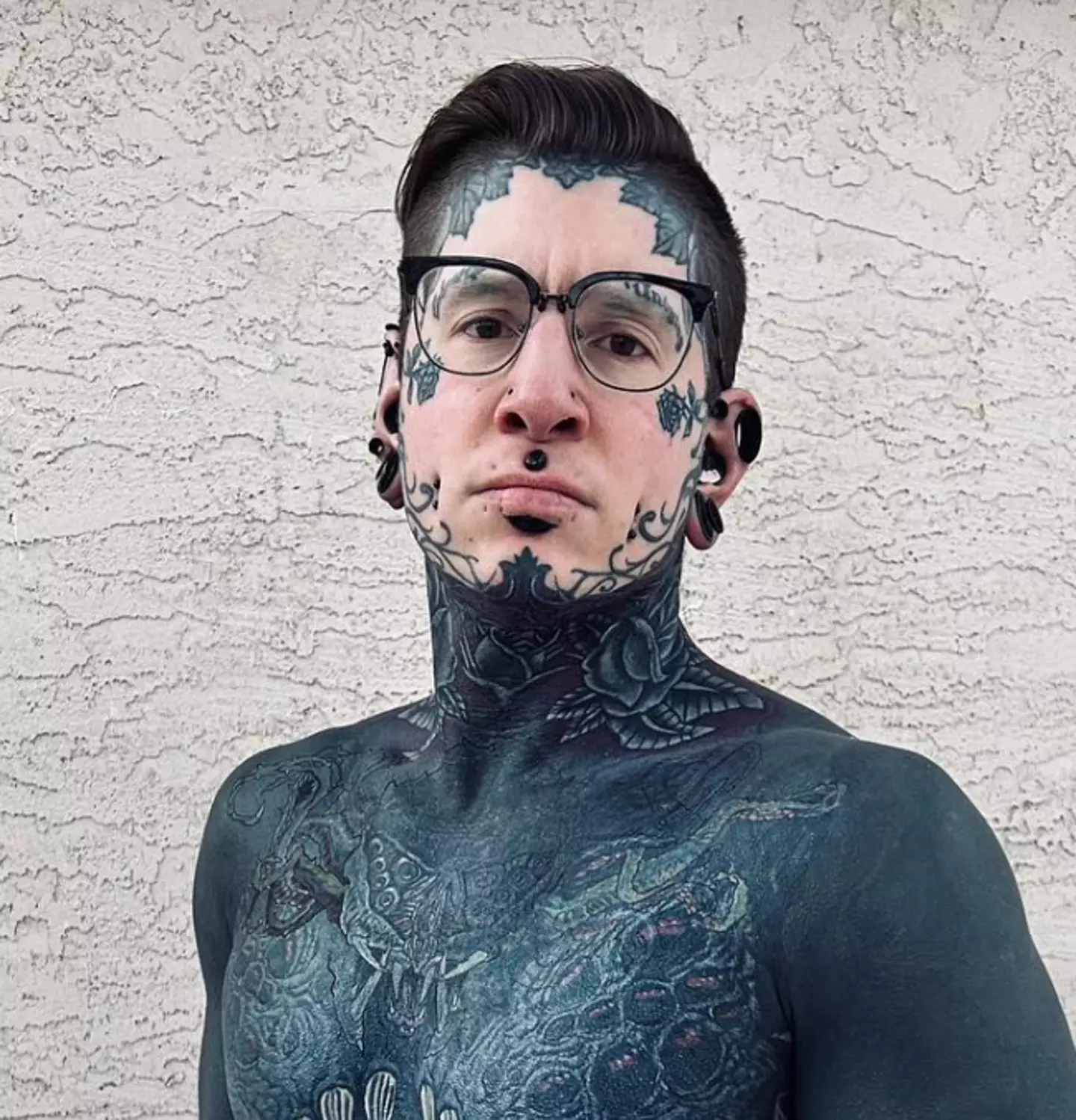 Extreme tattoo fan who spent £115k on ink says one piercing was the 'most painful thing I've ever done' 1 The bloke's had quite the transformation. (Instagram/@ephemeral__remy)