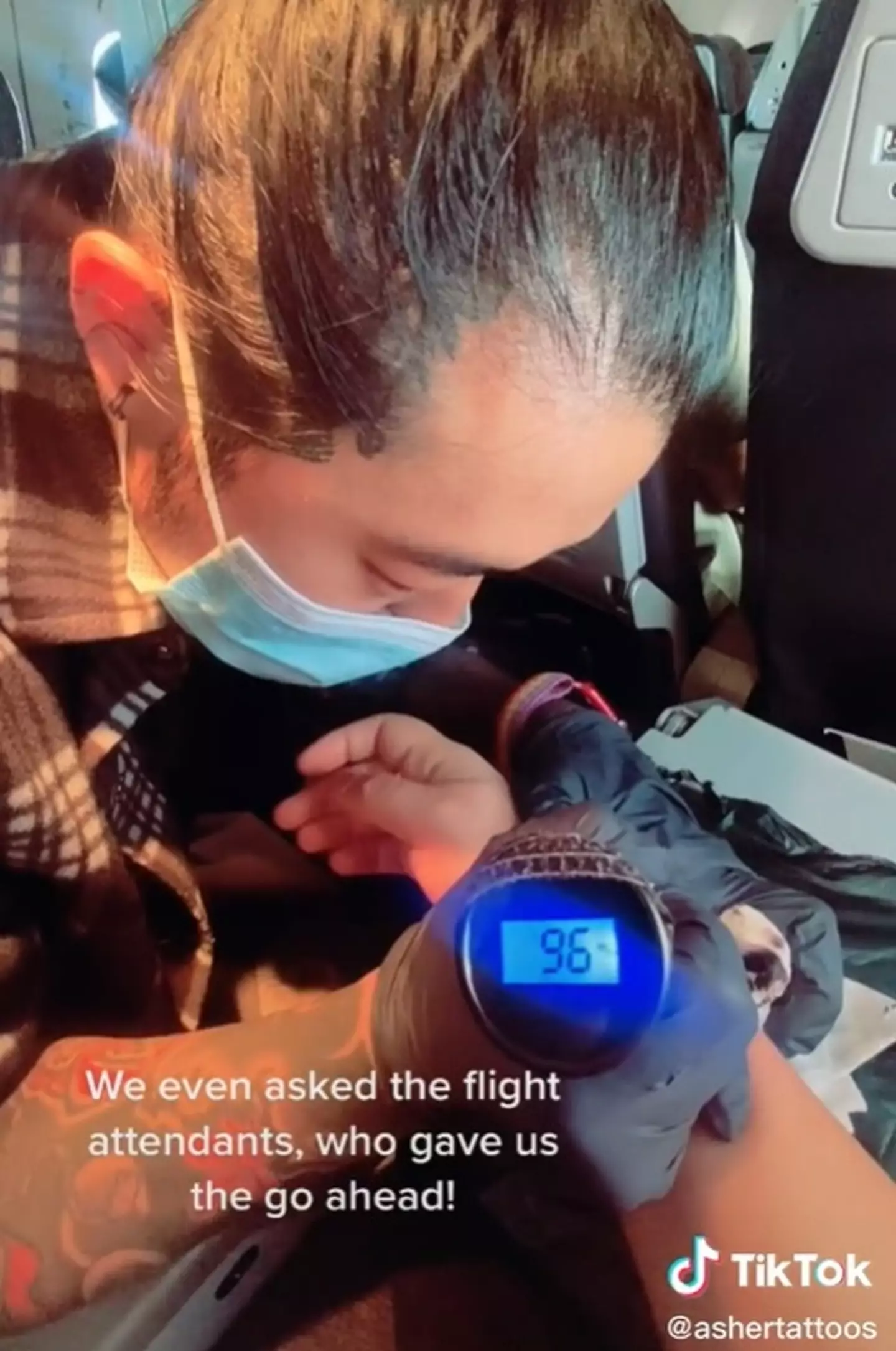 Flight attendants were absolutely fine with one of their passengers tattooing another mid-flight.