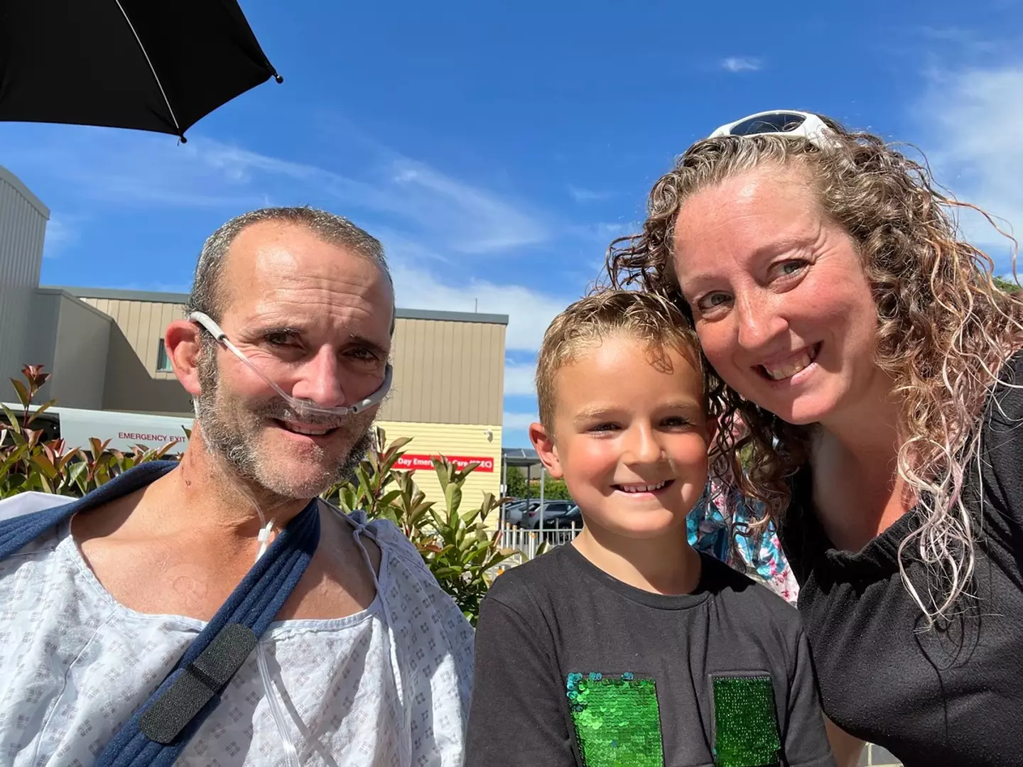 Mark Oakes, pictured with his wife and son.