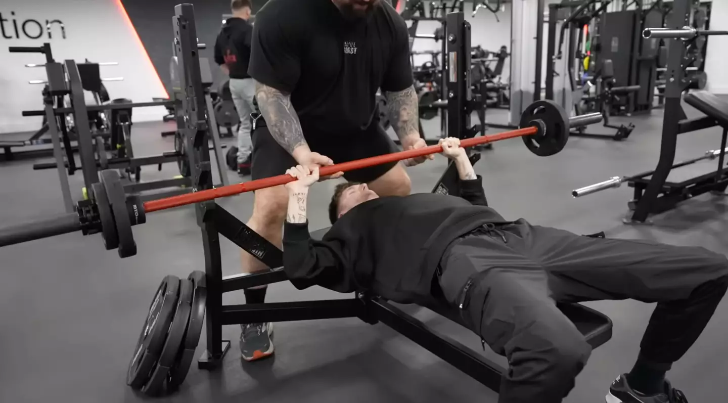 Jamie the camera man struggled under the strain of the bench press.