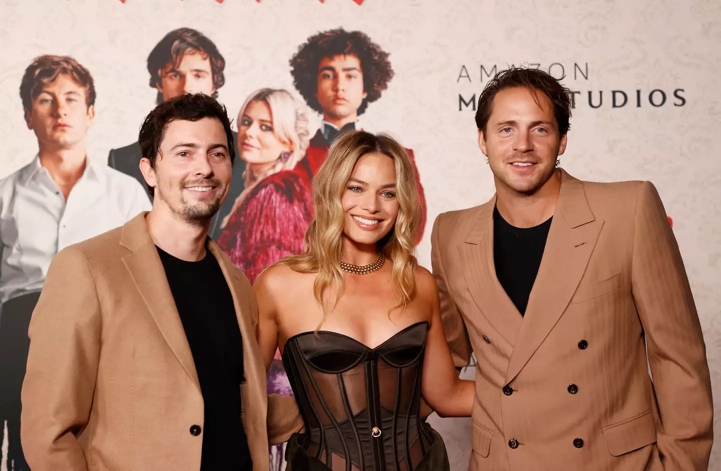 Josey McNamara, Margot Robbie and Tom Ackerley pictured at the Saltburn premiere.