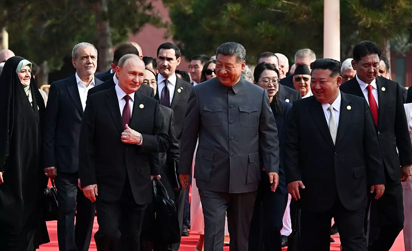 The trio were seen standing side-by-side at China's historic parade (SERGEY BOBYLEV/POOL/AFP via Getty Images)