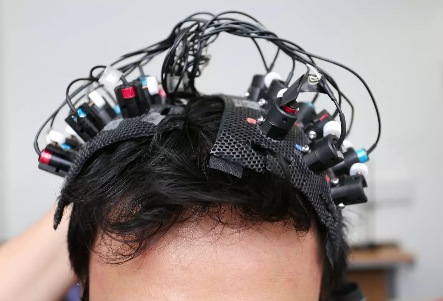 An experiment recording brain activity found the delay. (Getty Stock Photo)