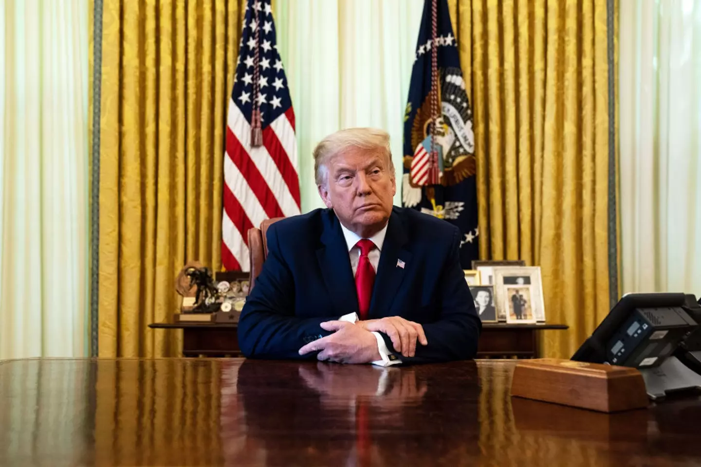 The Presidential Call button, which can be seen in the bottom right of this image, is found inside a wooden box (Anna Moneymaker/Pool/Getty Images)