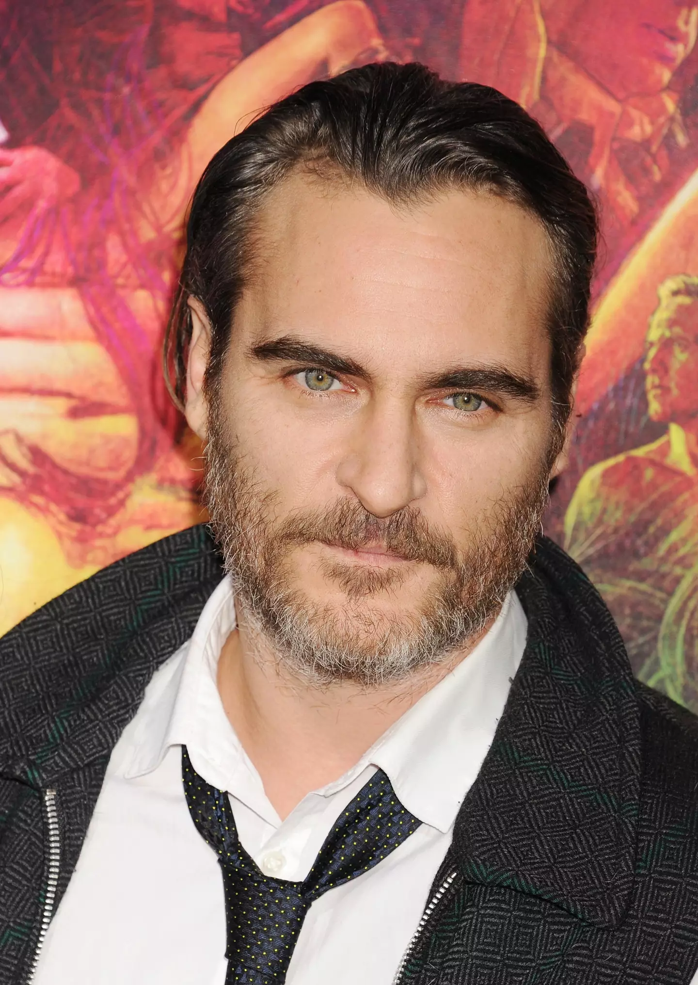 Joaquin Phoenix stared as the Joker in Joker (2019).