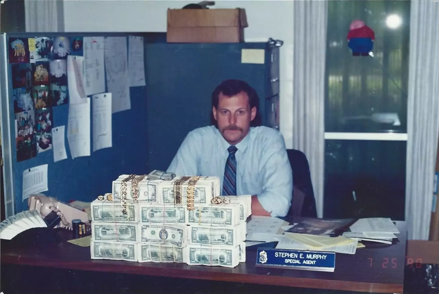 Steve Murphy following a cash seizure as part of his work with the DEA.