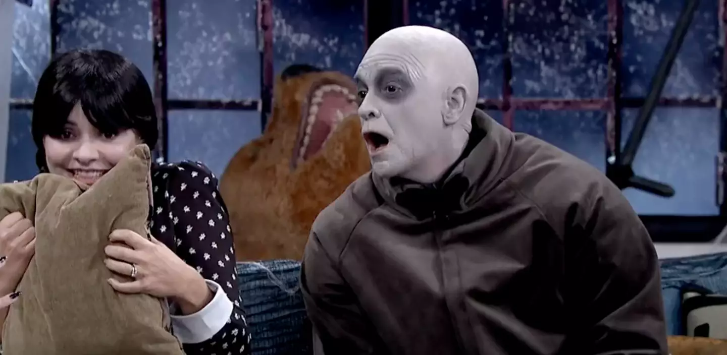 Holly hid behind a pillow as the ghost appeared.