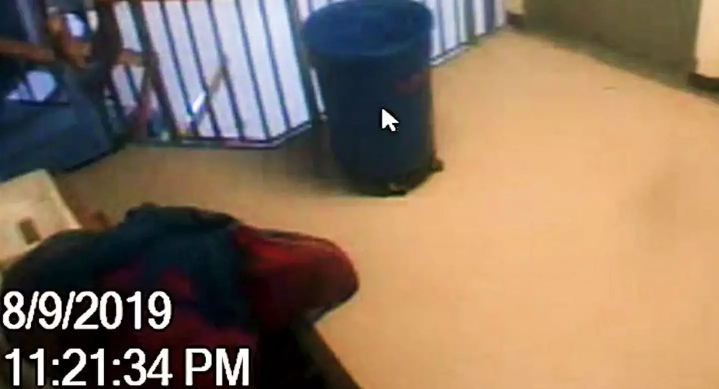 A cursor also bizarrely appears on screen at one point in the surveillance video (CBS News)