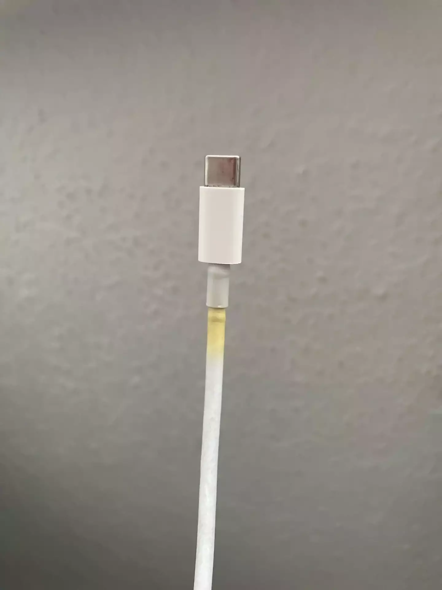 You might want to get a new charger if it's beginning to yellow.