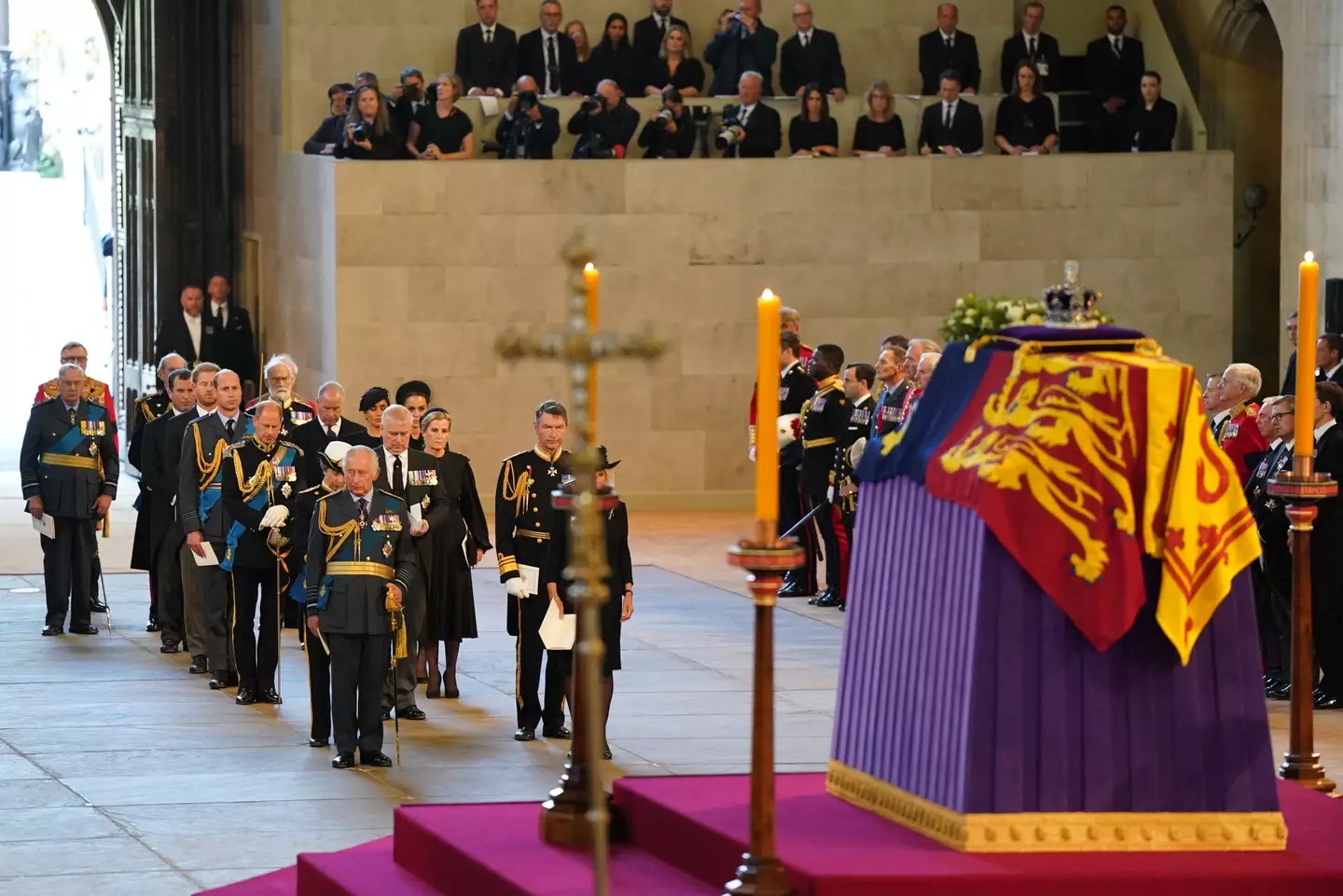 King Charles III, his sons, and his siblings followed the casket into the hall.