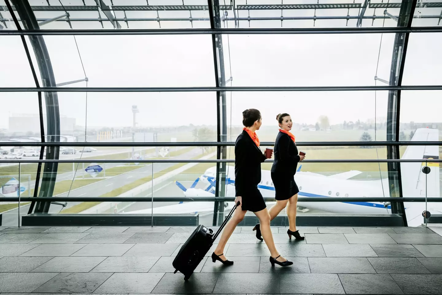 Cabin crew on their way to their flight (Getty Stock Images)