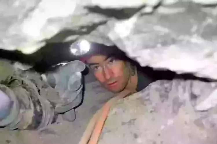 John Edward Jones got stuck while spelunking in Nutty Putty Cave (Family Handout)