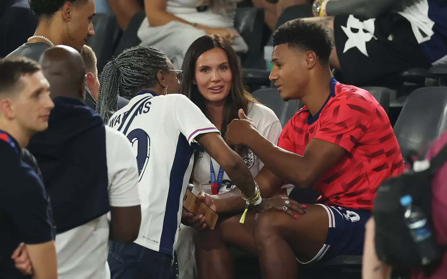 The striker seen debriefing his mum and girlfriend Ellie Alderson, 28, after bagging the winning goal (Richard Pelham/Getty Images)