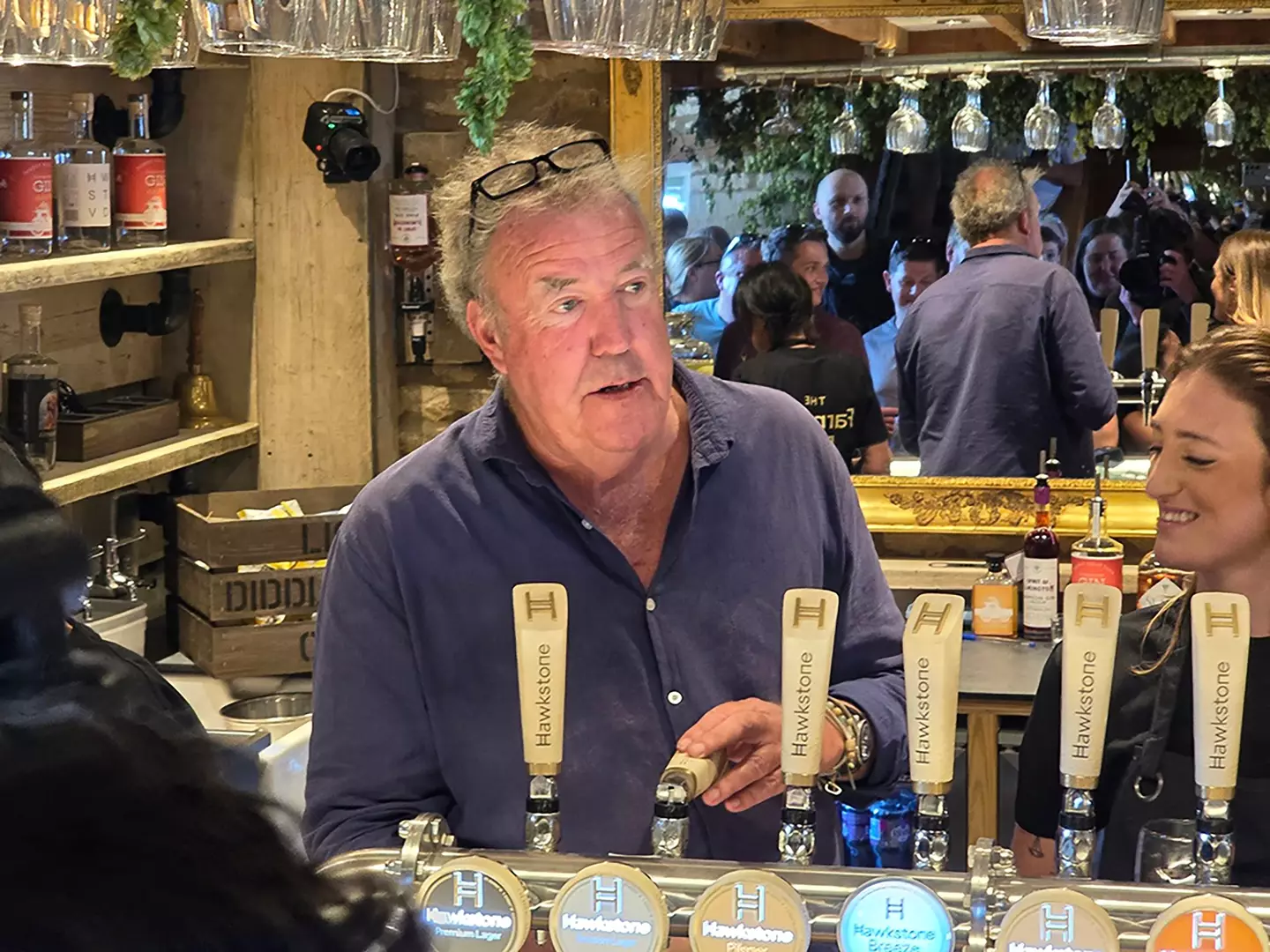 Clarkson behind the bar in his pub (Neil Robinson/PA Wire)